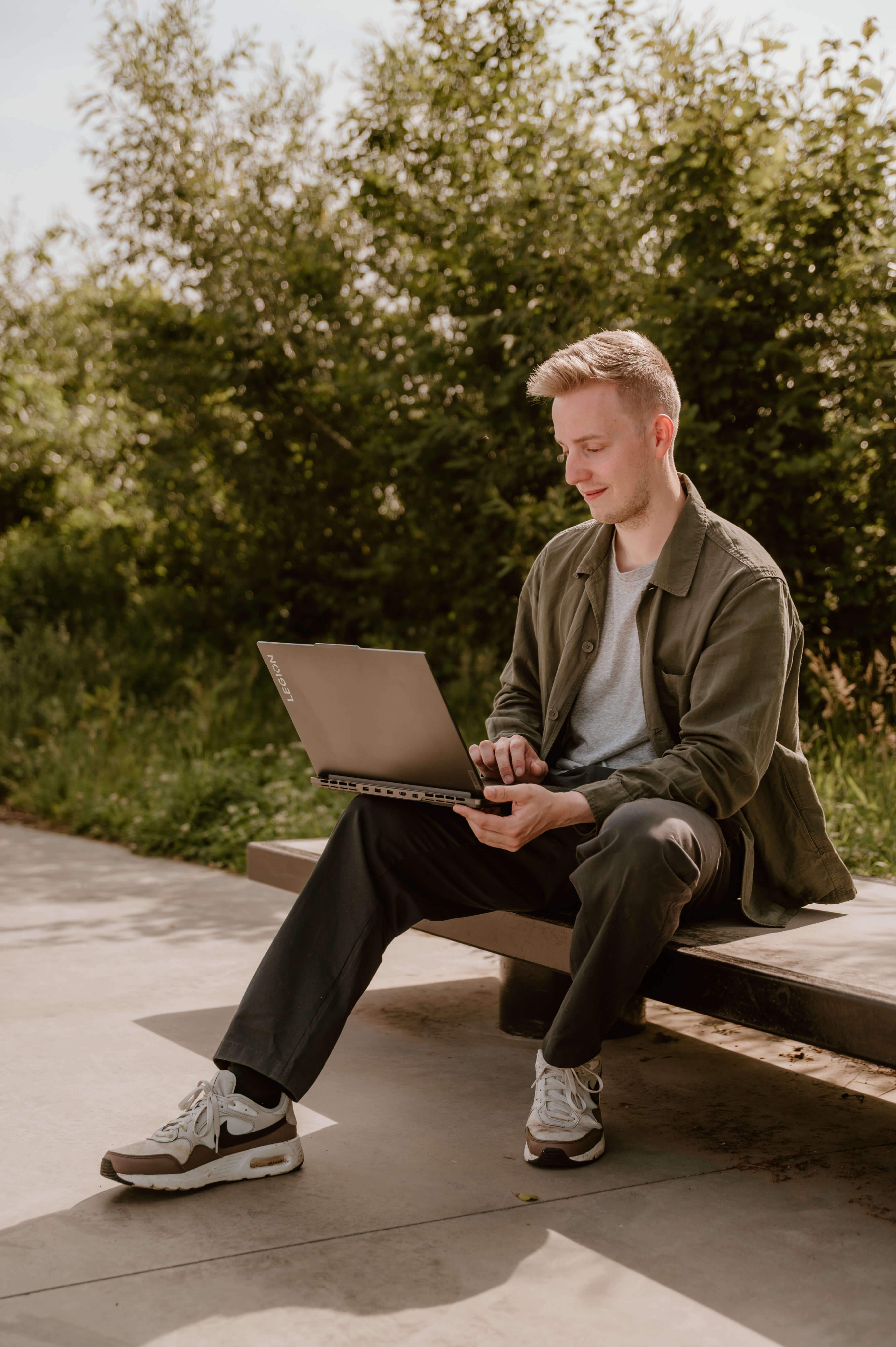 Jasey working on his laptop